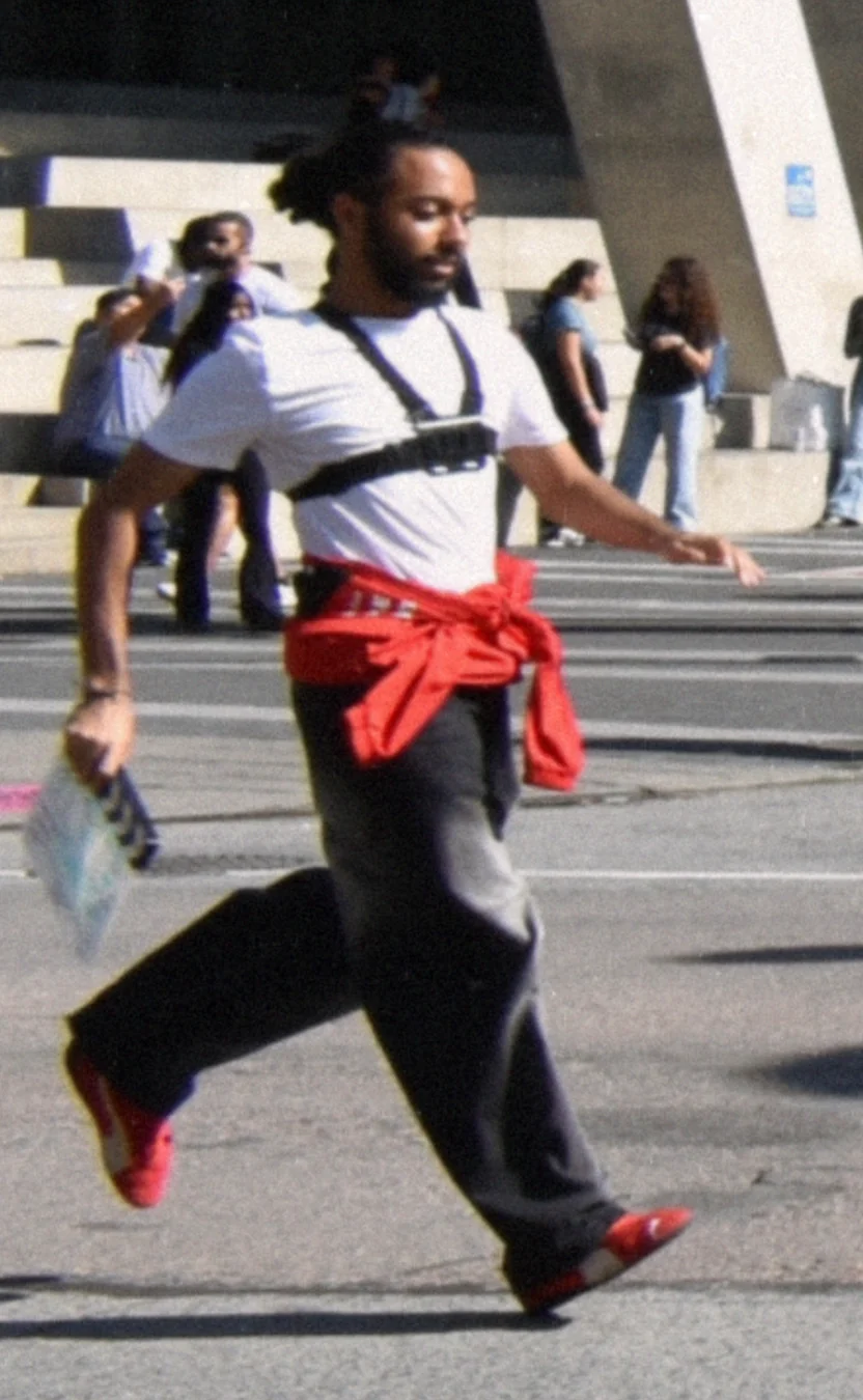 Amr Rabie moving through a production location with his camera harness