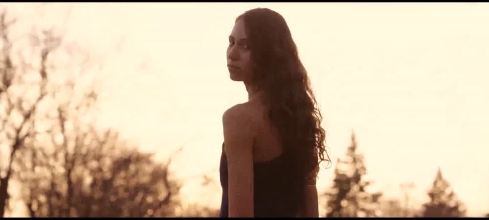 Sunlit portrait from the NOR fashion film